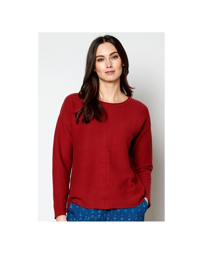 Maglione rosso lavorato a maglia in cotone biologico.